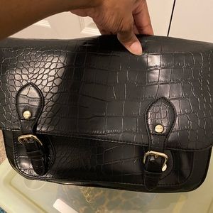 Crocodile print satchel.